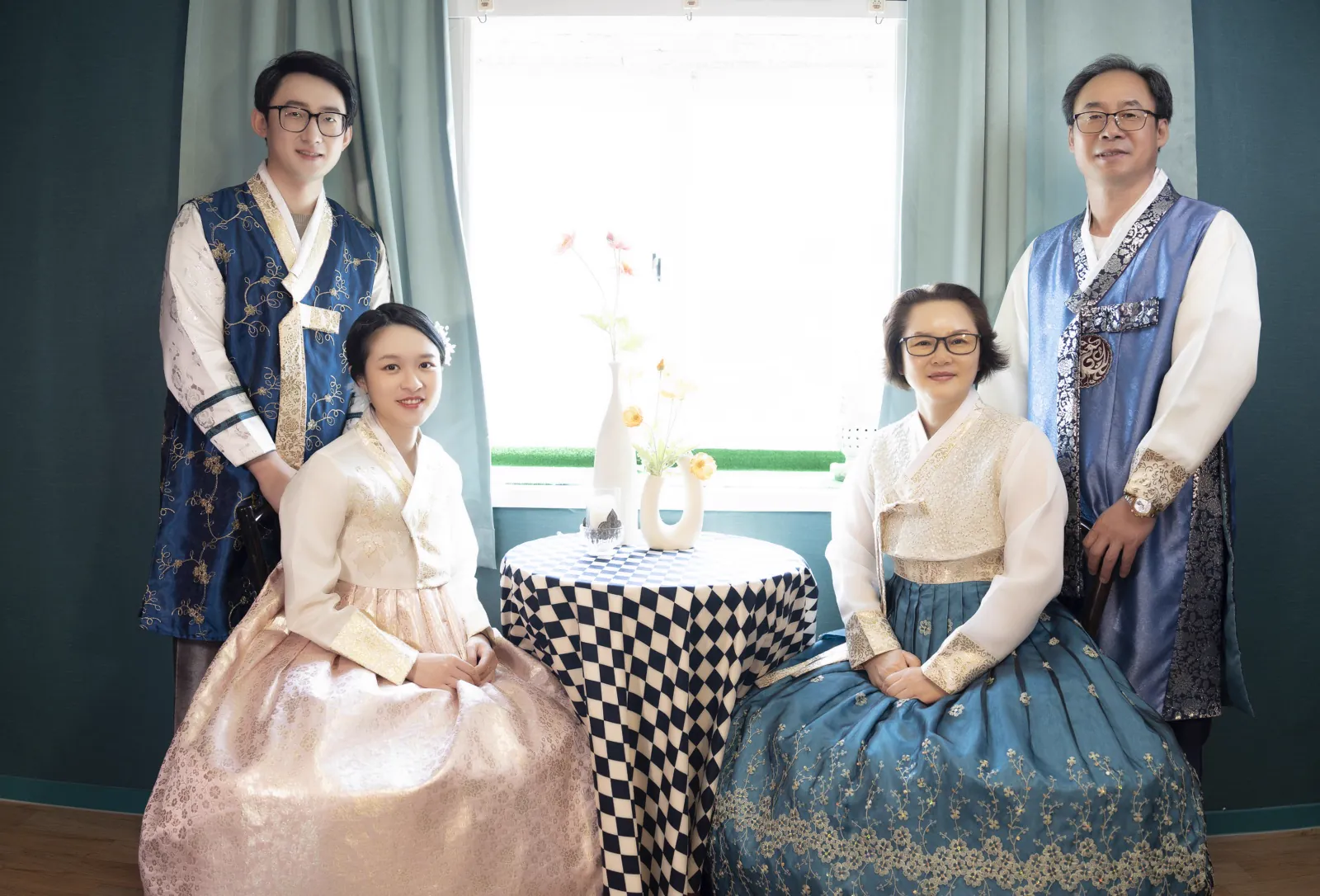 A family in hanbok photographed inside Botong Lee Studio