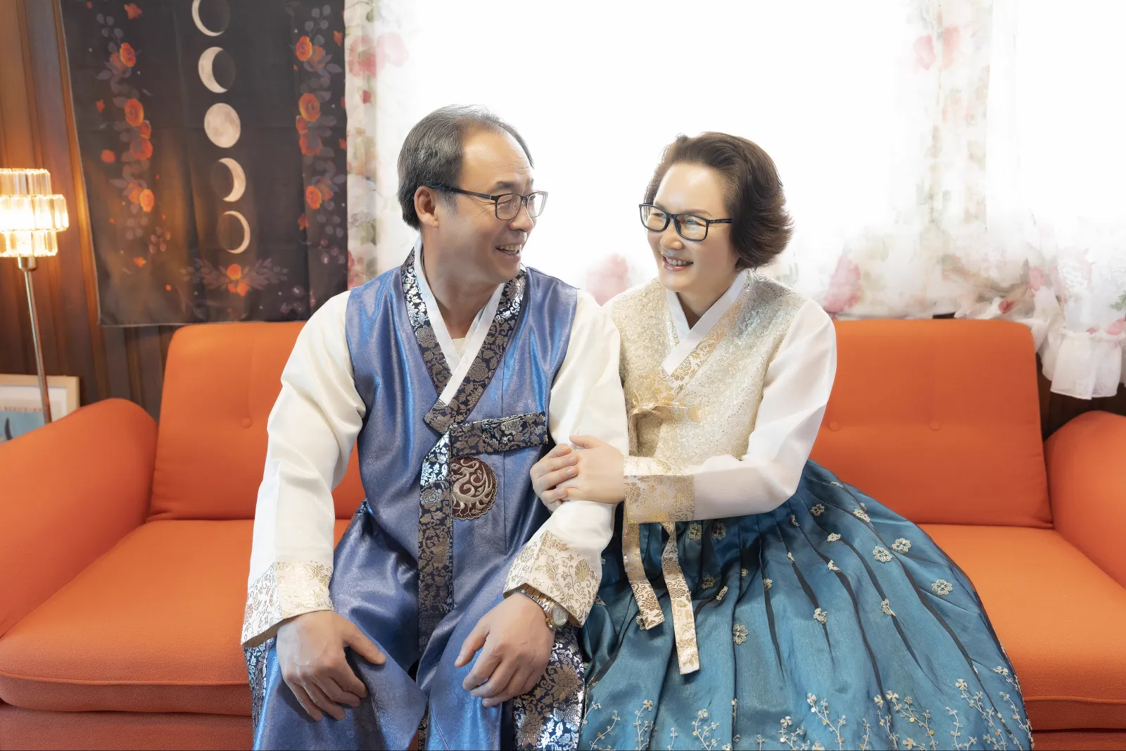 An older couple photographed together inside Botong Lee Studio