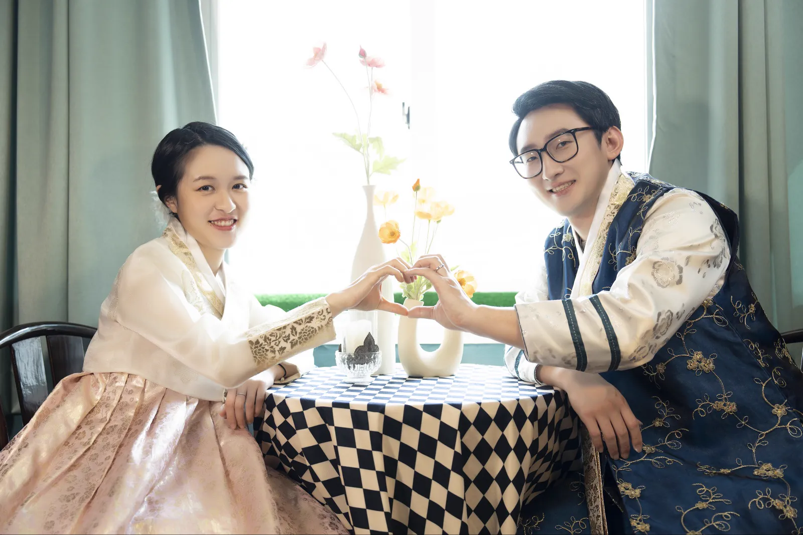 A visiting couple photographed inside Botong Lee Studio before their outdoor Seoul session
